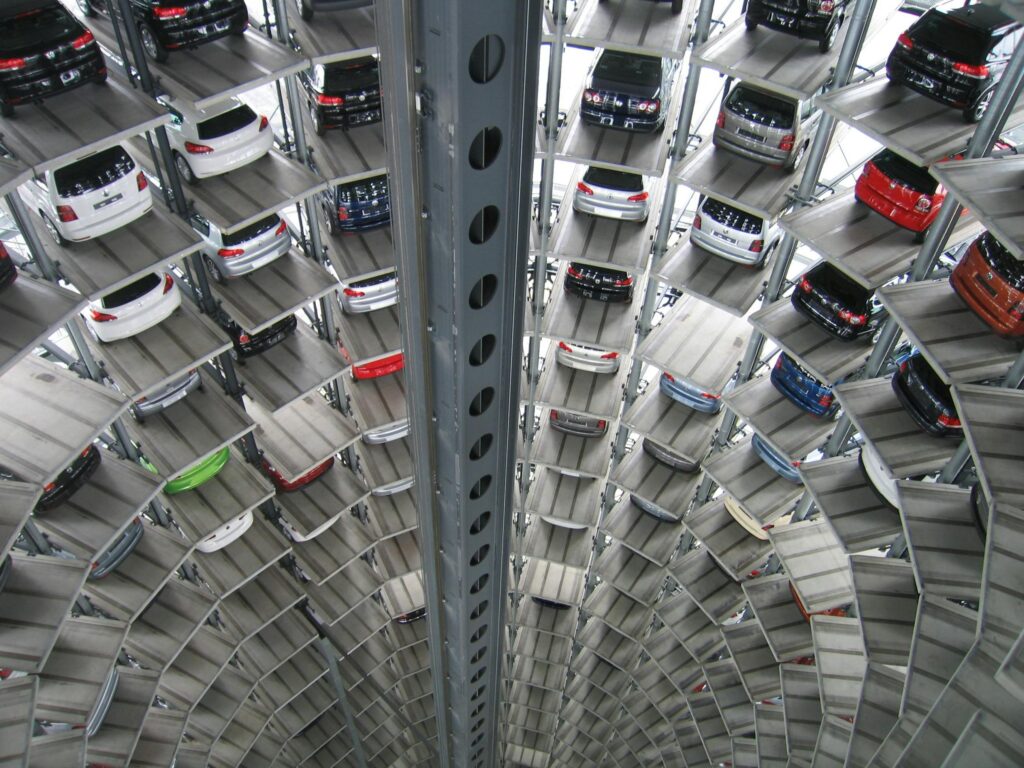 A photo of an automated parking system studied in market research on smart mobility.